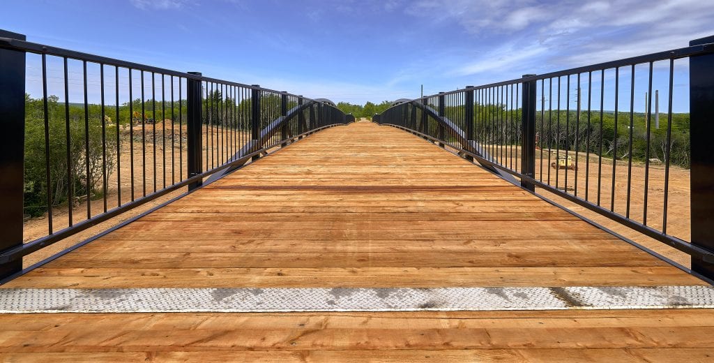 Close-up view of wood decking on Bowstring Truss Trail Bridge