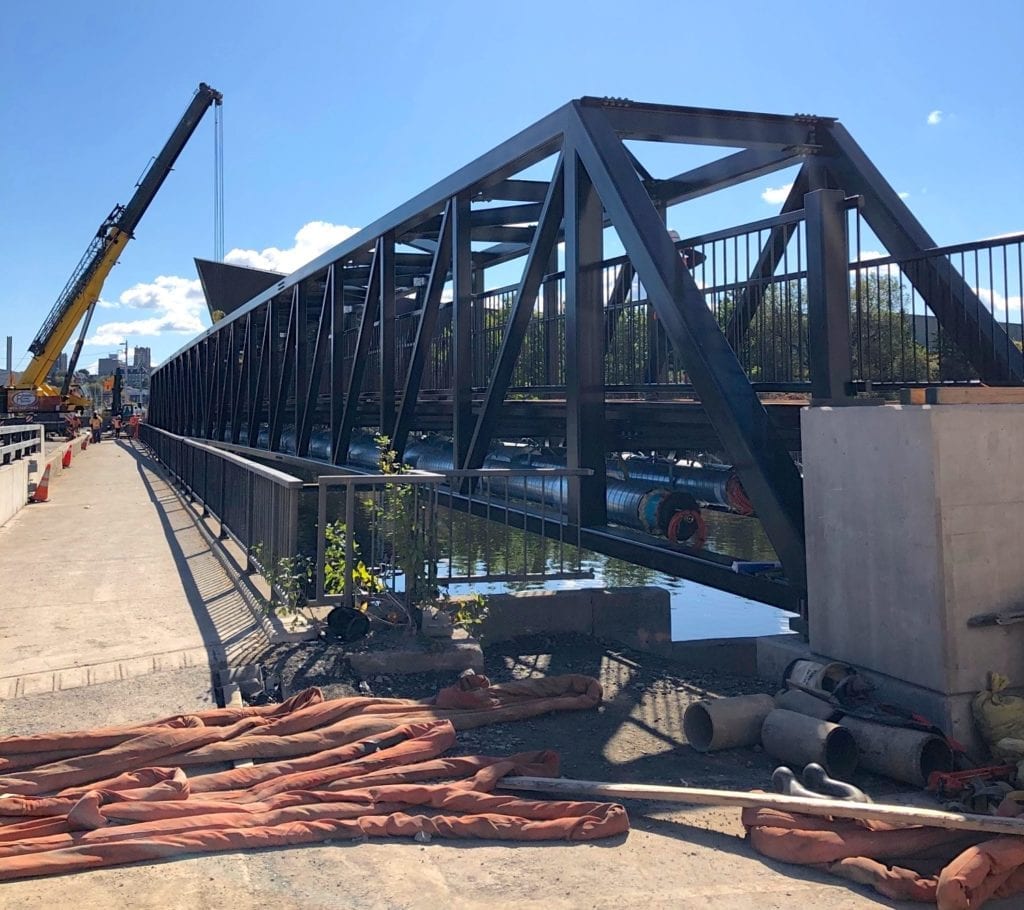 Ottawa’s Zibi pedestrian utility bridge installed on abutments