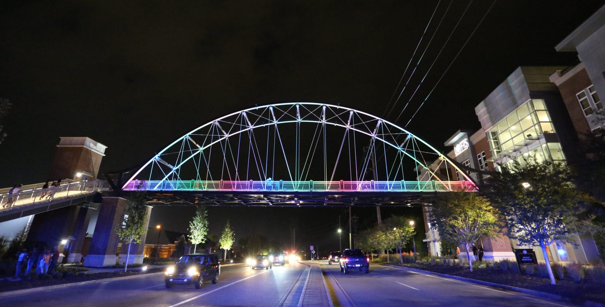 Wide view of pedestrian bridge design with LED lighting