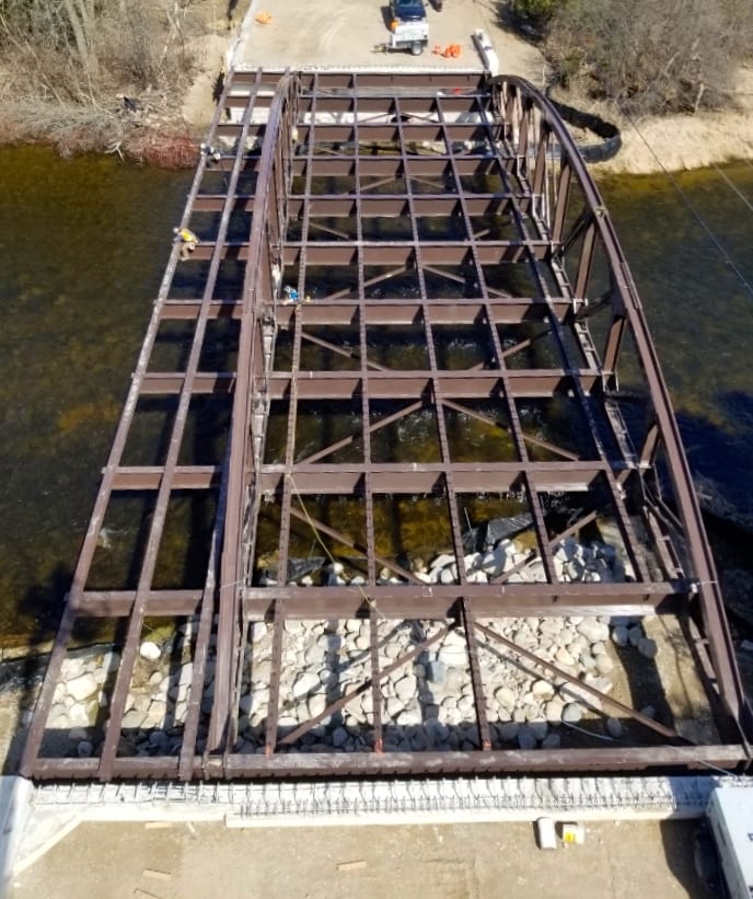 Aerial view of vehicular truss bridge superstructure
