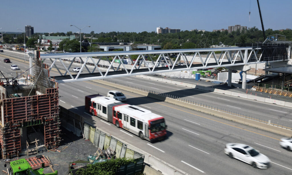 Aerial view of Queensview LRT station pedestrian bridge