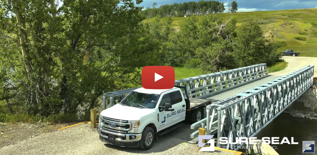 Truck crossing Bailey-Bridge-style Modular Bridge system