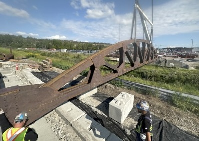 Installation view #1 of T1000 Bowstring Bolted Truss Bridge