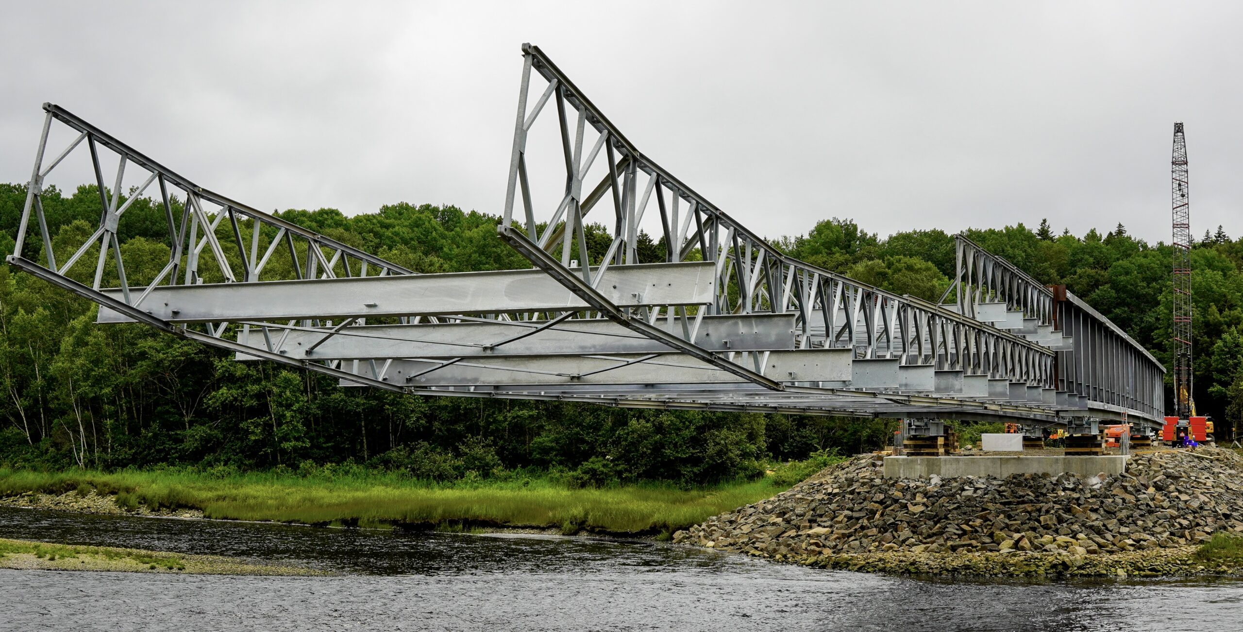 Cantilever launch of modular bolted truss-bridge