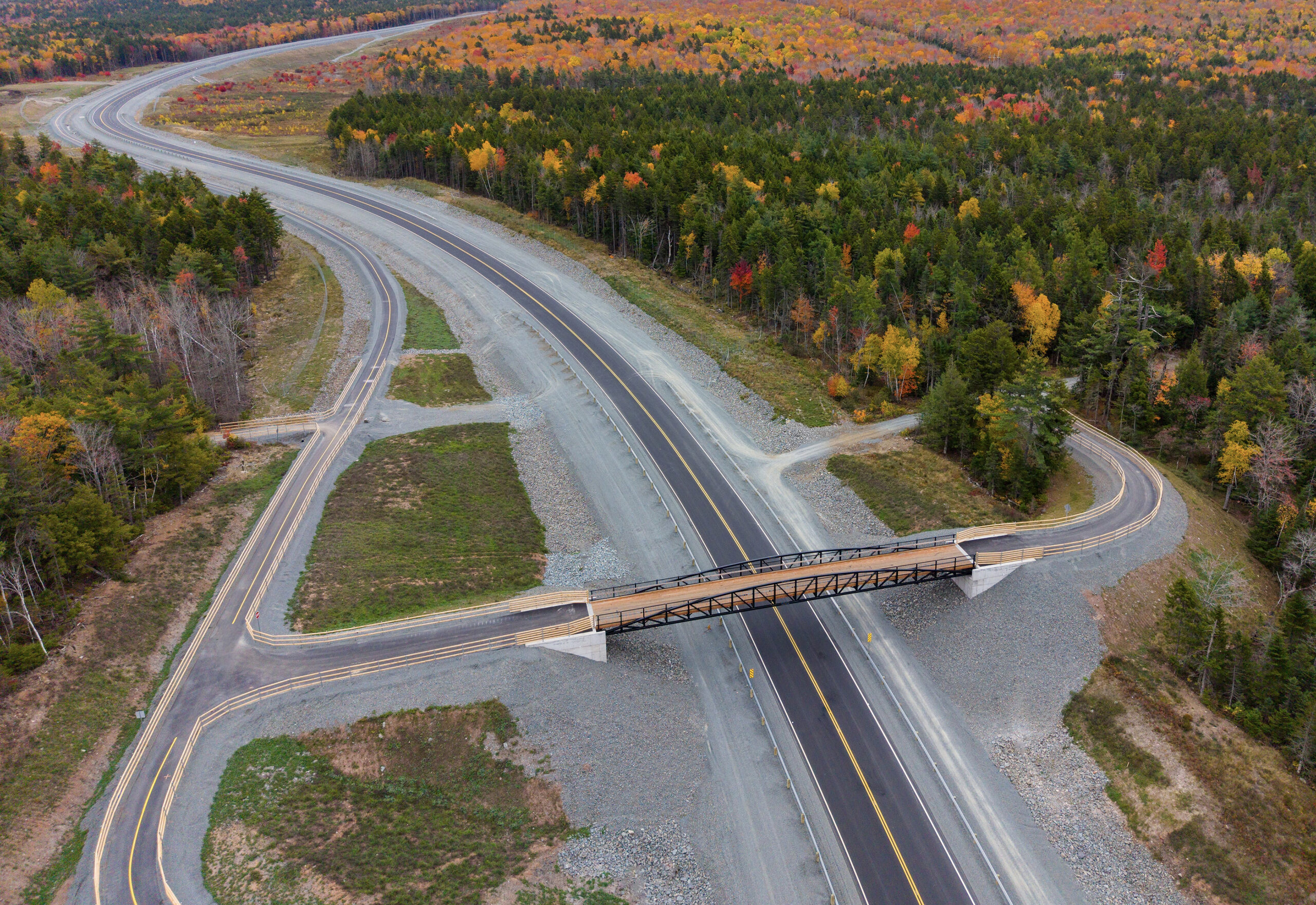 Wide aerial view of prefabricated trail bridge
