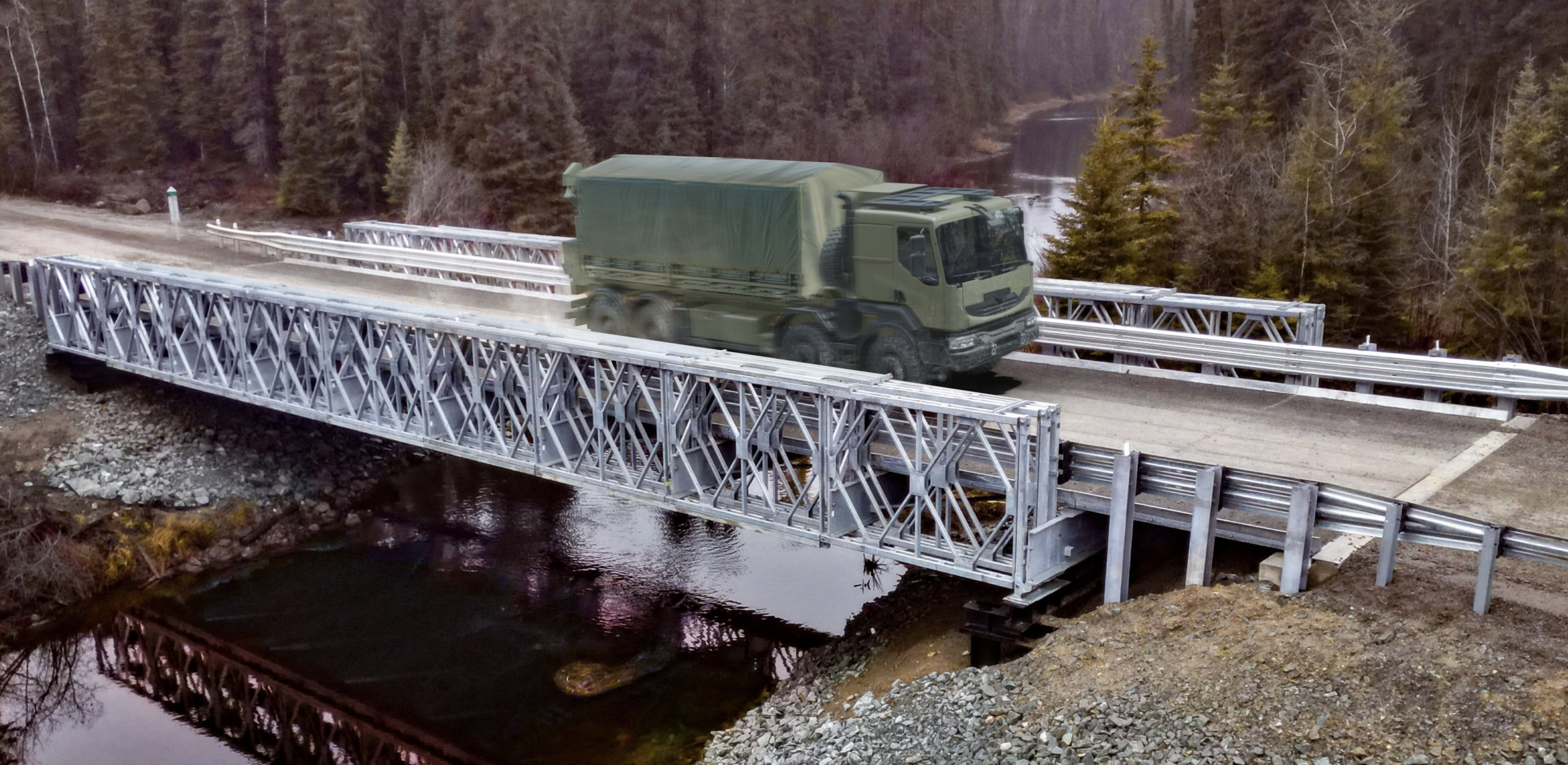 Angled view of military truck crossing modular panel bridge