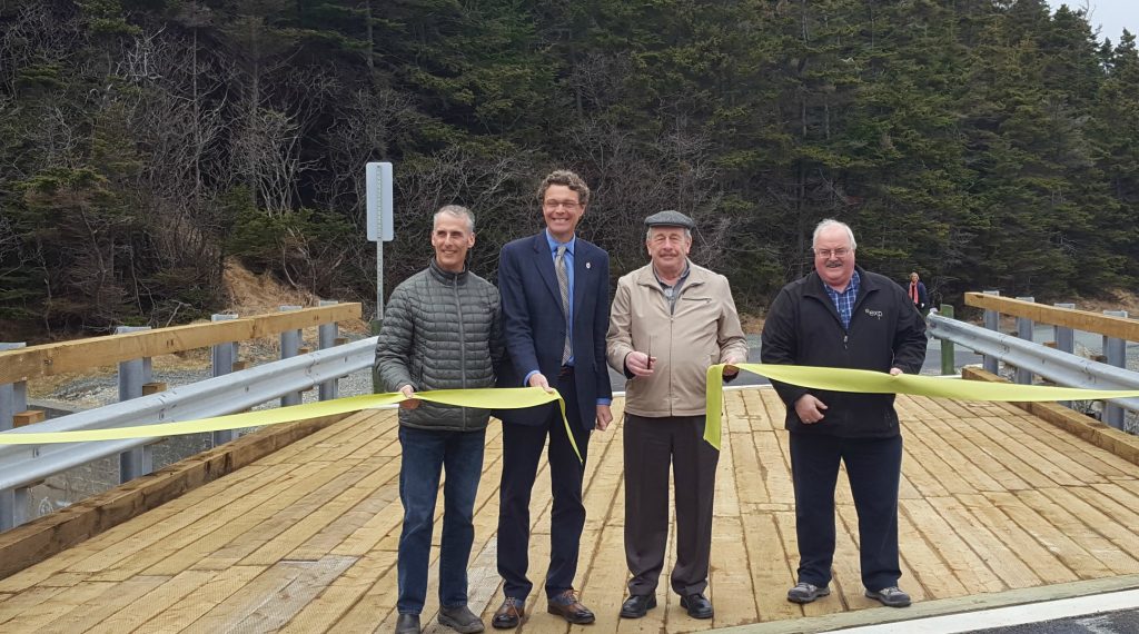 ribbon-cutting ceremony on new girder bridge